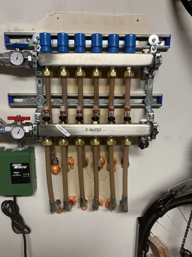 Plumber performing Water Heater Repair at a residential property in Robbinsville